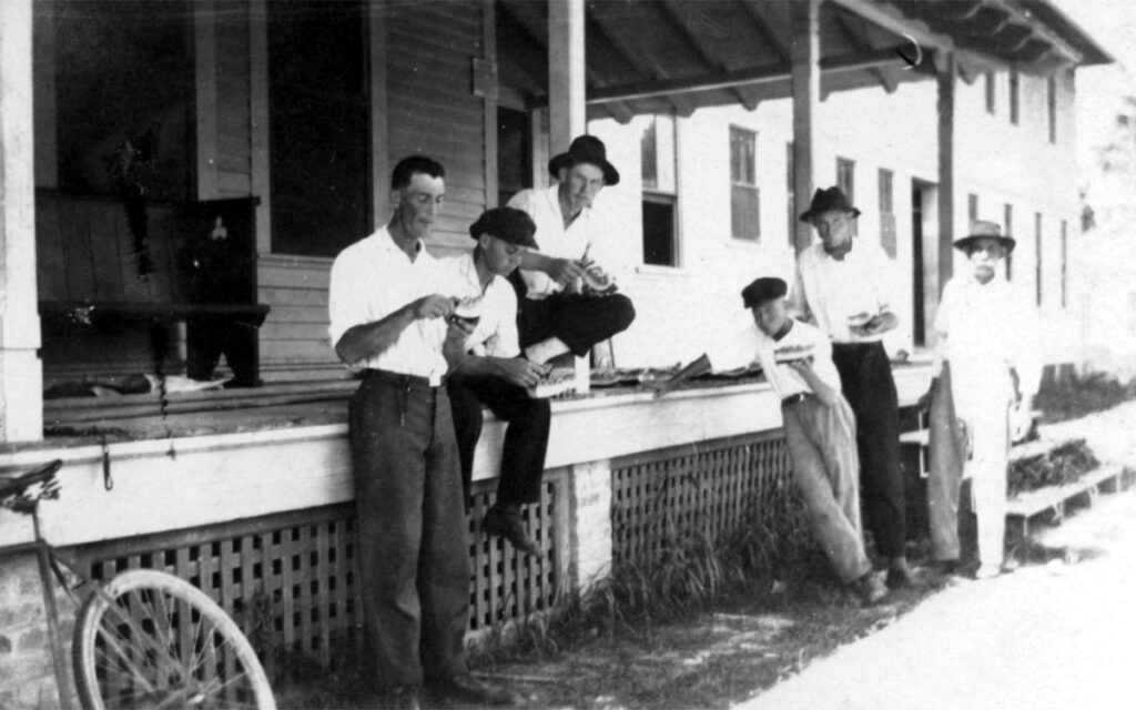 Employees eat watermelon